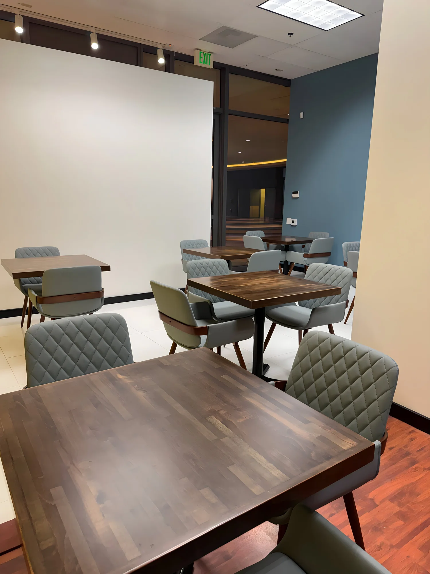 The cafe and gathering side, set with tables